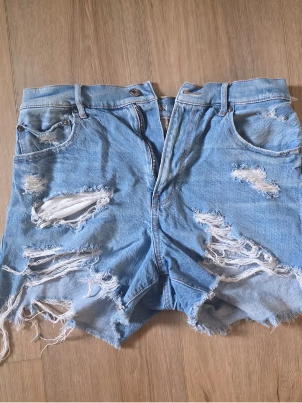 Women's Light Blue Distressed Denim Shorts